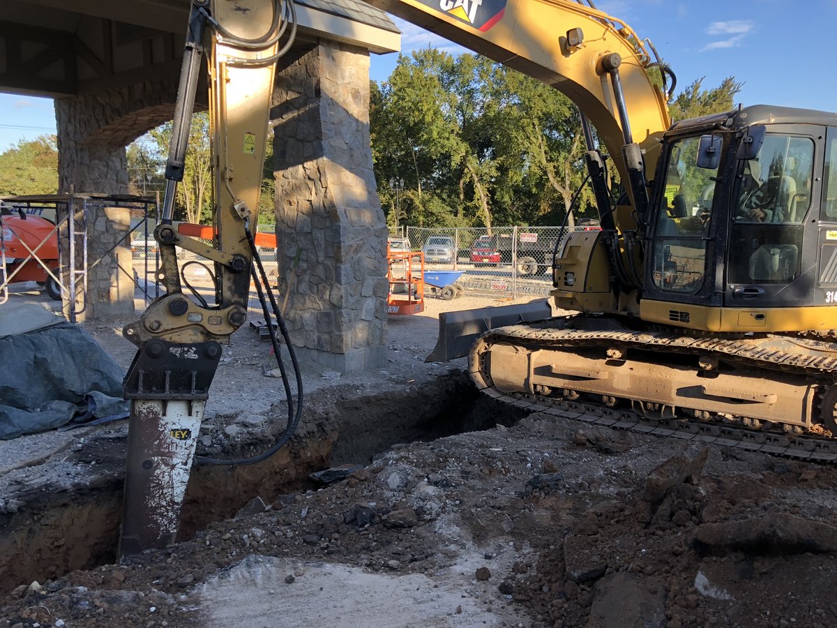 Hydraulic hammer breaking rock near the clubhouse at Crestmont.